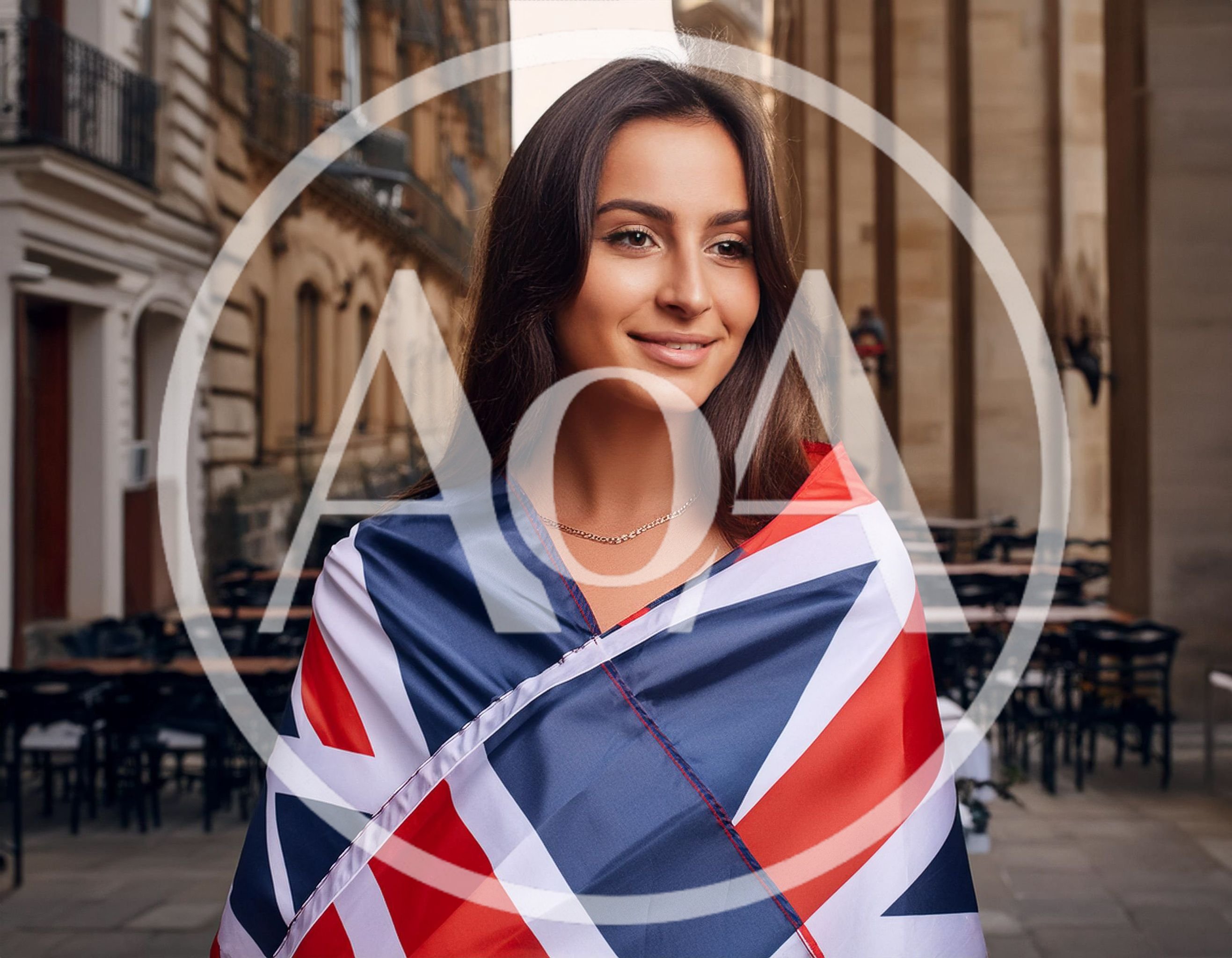 Young Woman Wrapped In A British Flag Outdoors