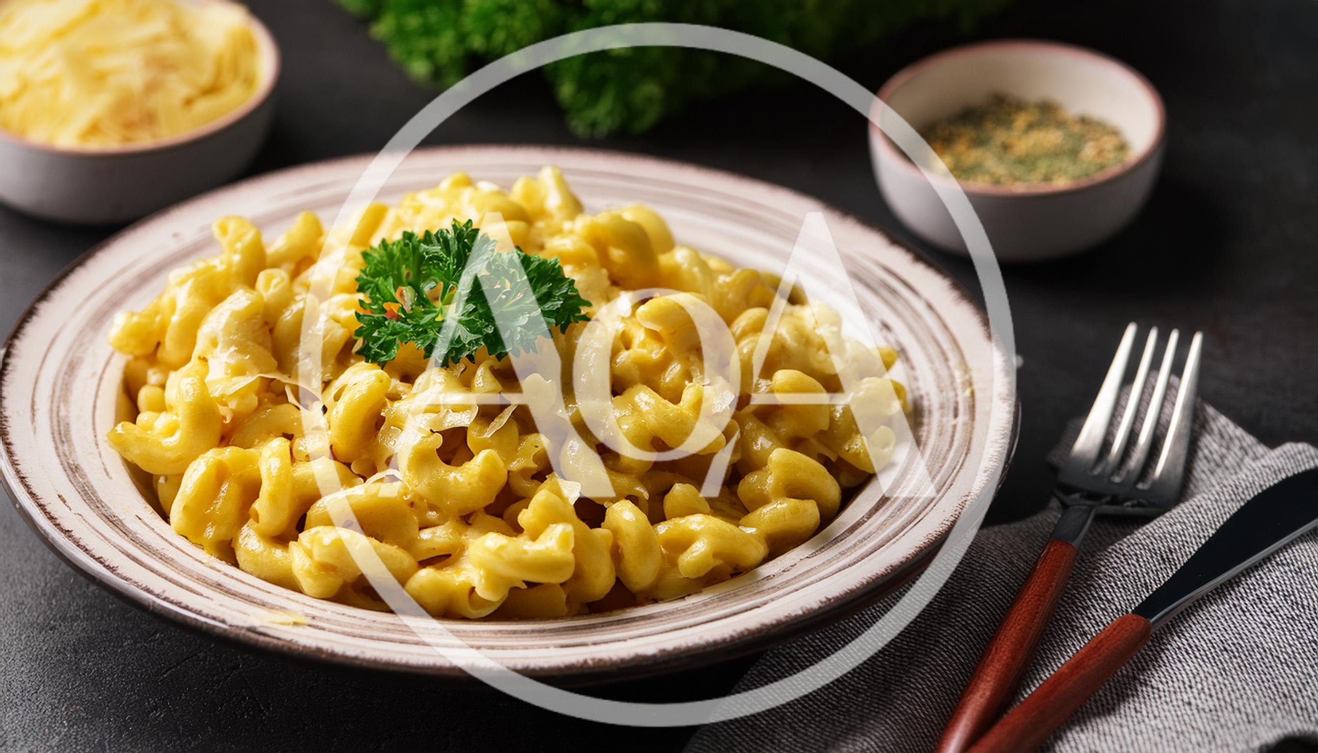 Bowl Of Creamy Macaroni And Cheese With Parsley