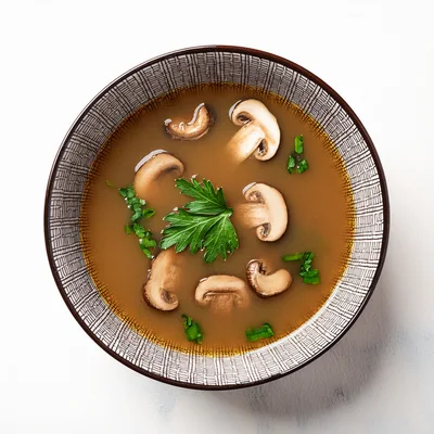 Top View Of Mushroom Soup In A Patterned Bowl