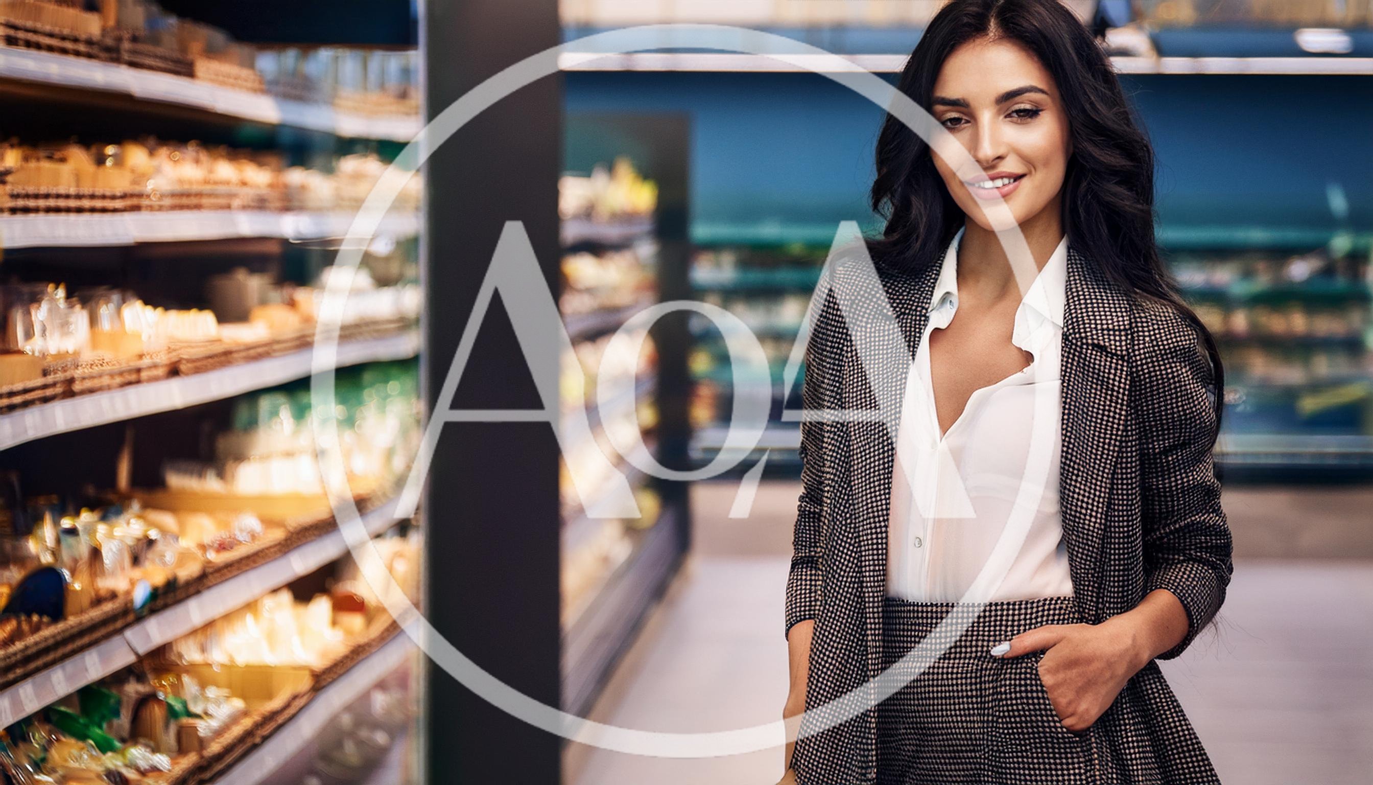 Professional Woman Shopping In A Modern Grocery Store