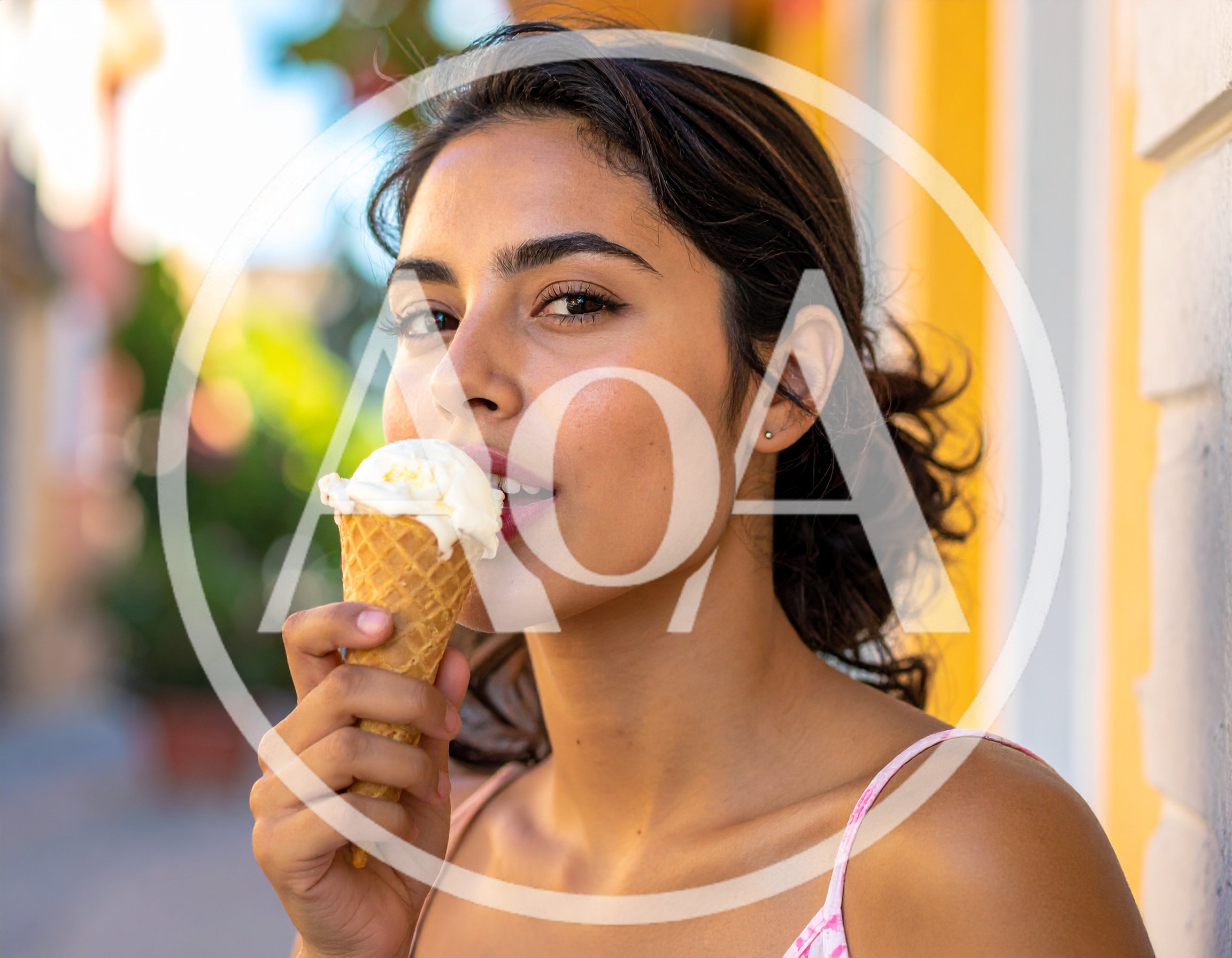 Young Woman Eating Ice Cream Cone Outdoors