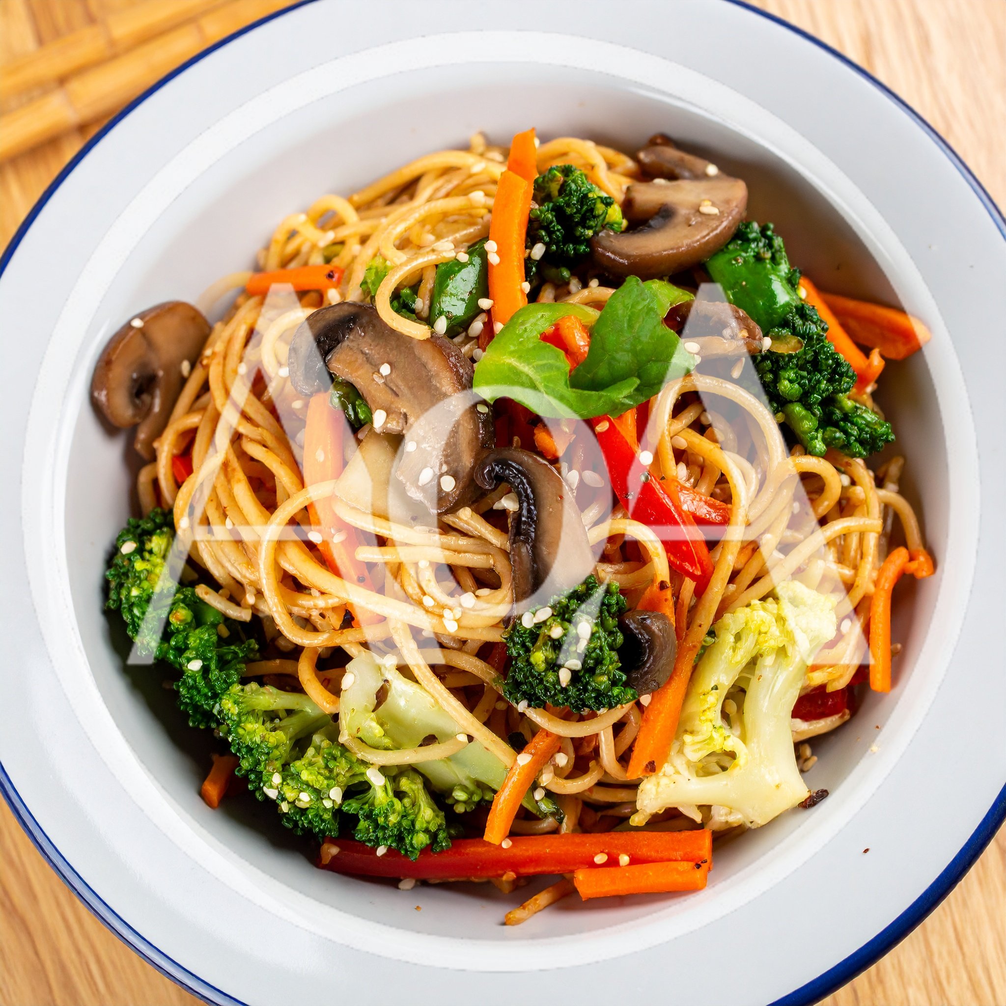 Stir Fried Vegetable Noodles In A White Bowl