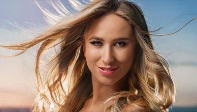 Portrait Of A Beautiful Blonde Woman With Windblown Hair