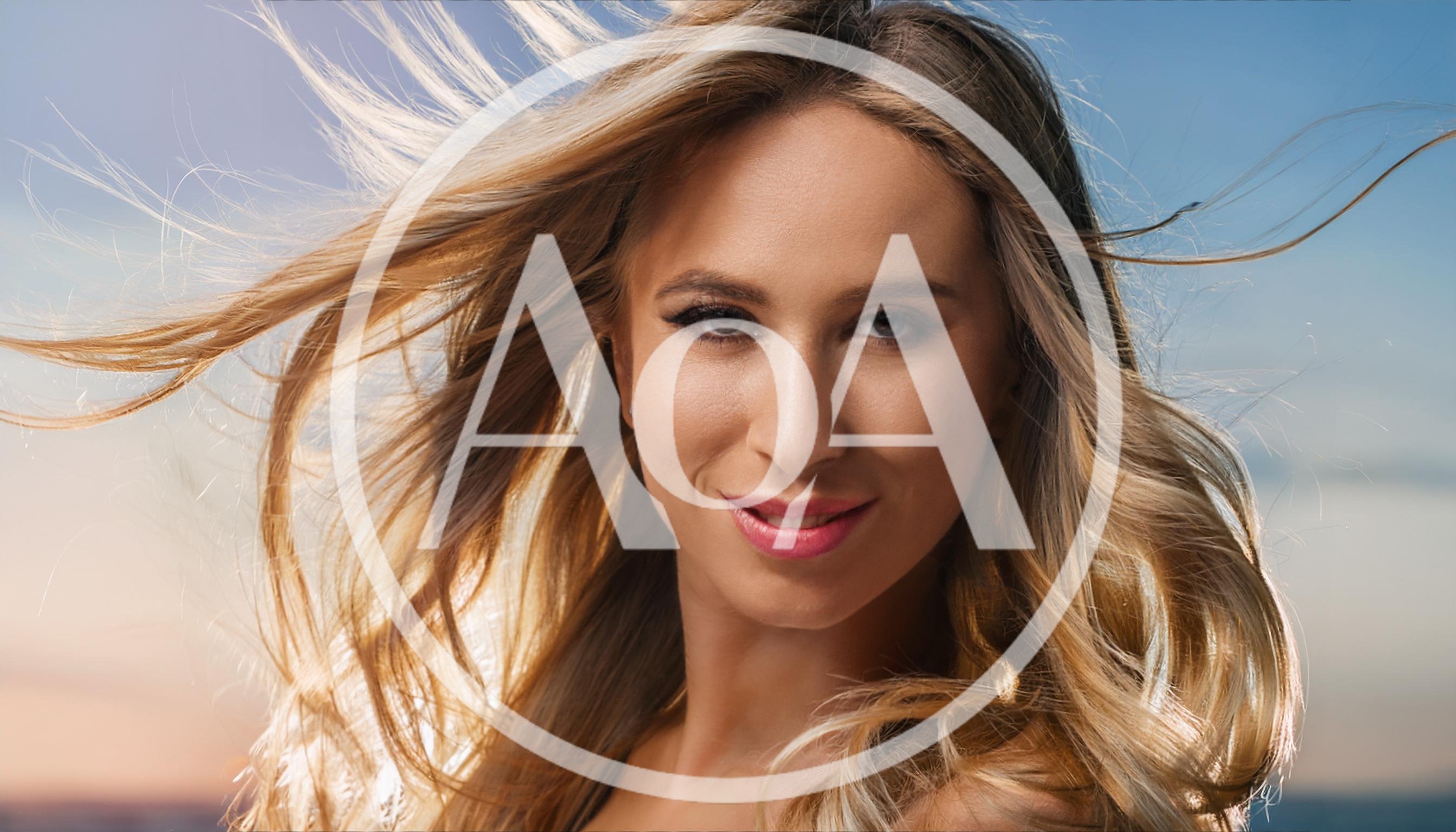 Portrait Of A Beautiful Blonde Woman With Windblown Hair