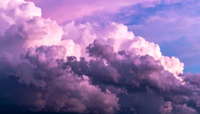 Dramatic Purple And Pink Storm Clouds At Sunset