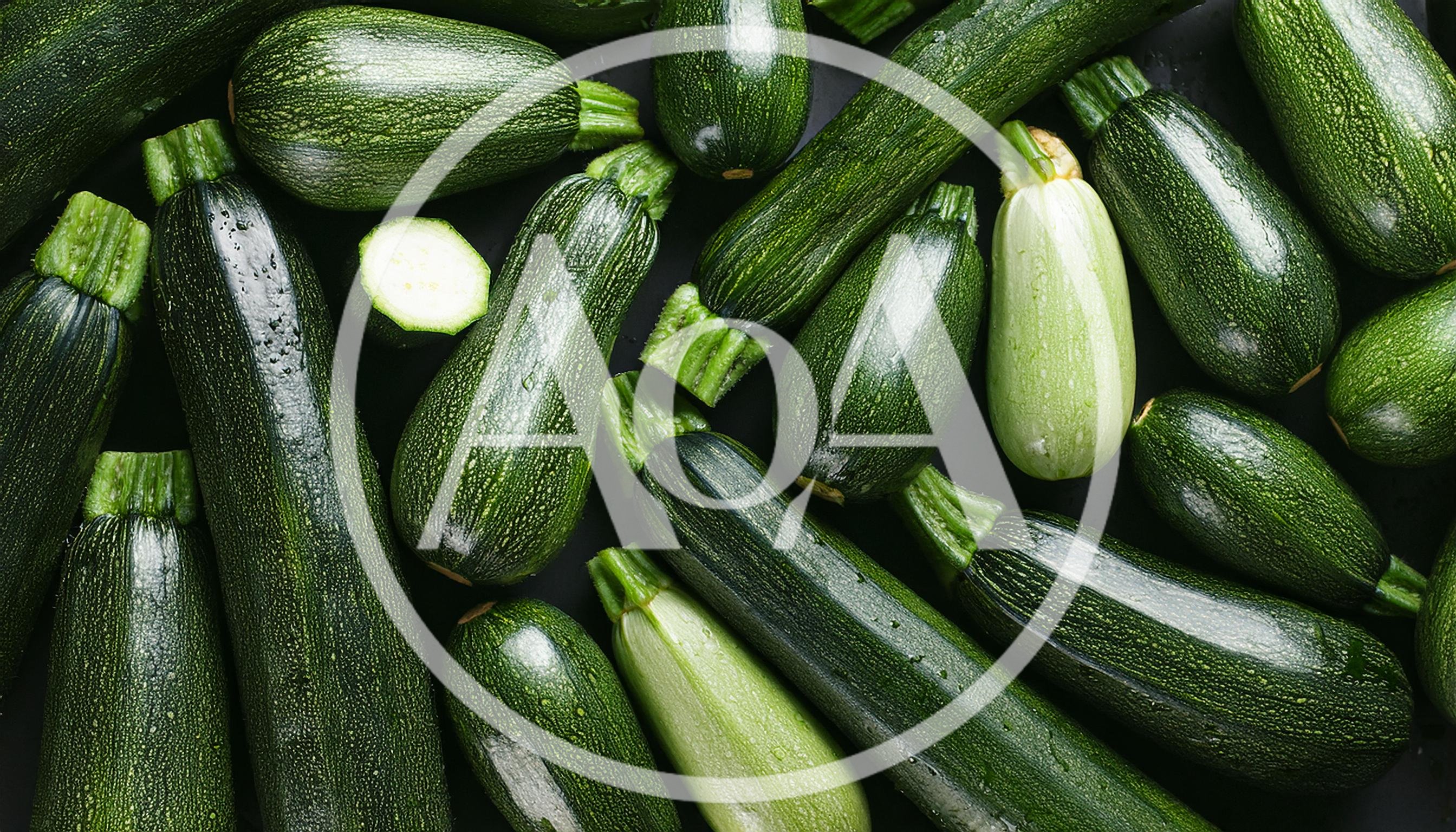 Fresh Green Zucchini Squash on Dark Background