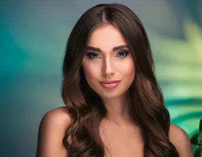 Portrait Of A Beautiful Woman With Long Wavy Hair