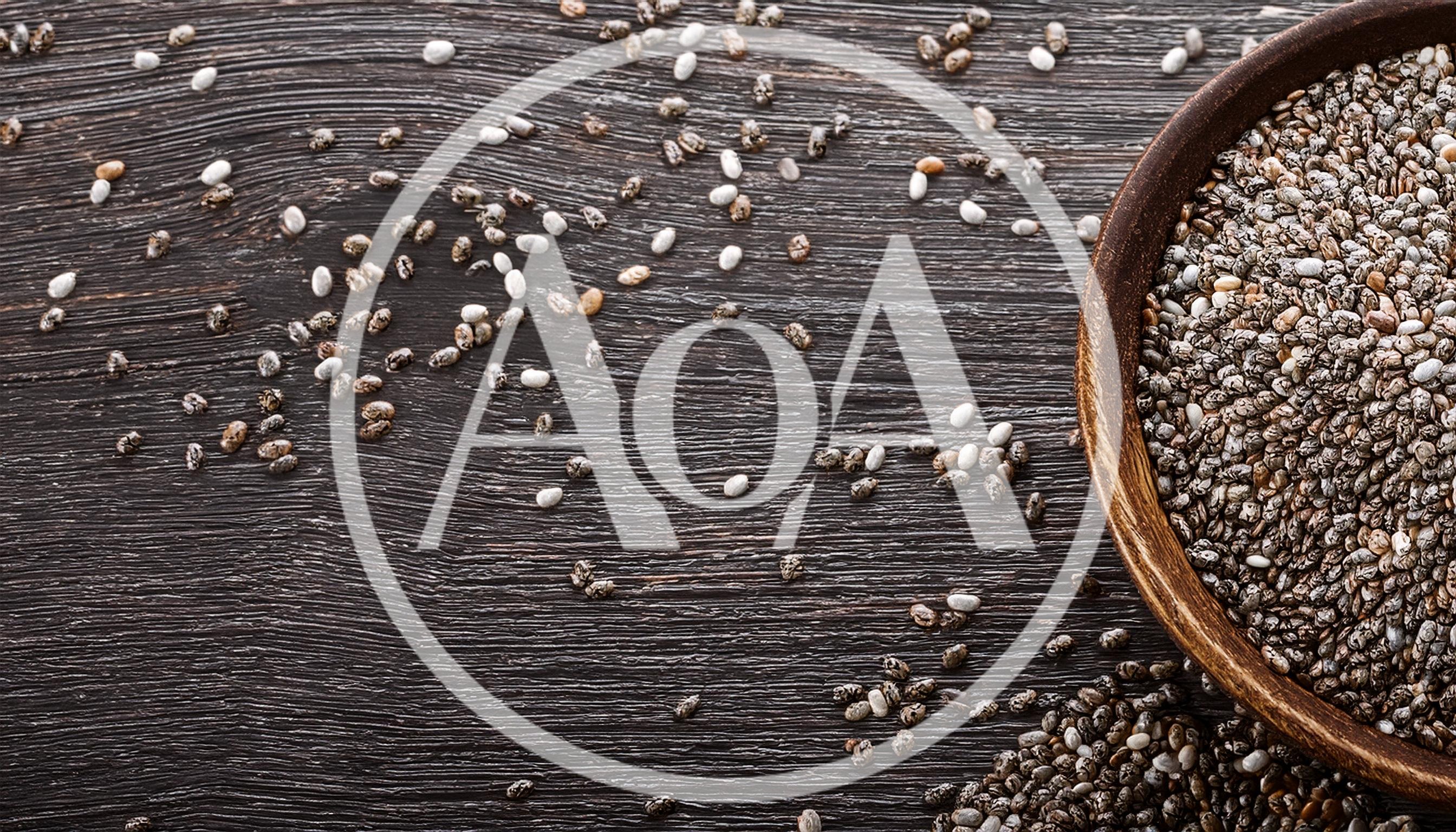 Chia Seeds In A Wooden Bowl On Dark Wood