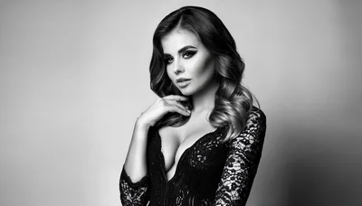 Glamorous Woman In Black Lace Dress Posing