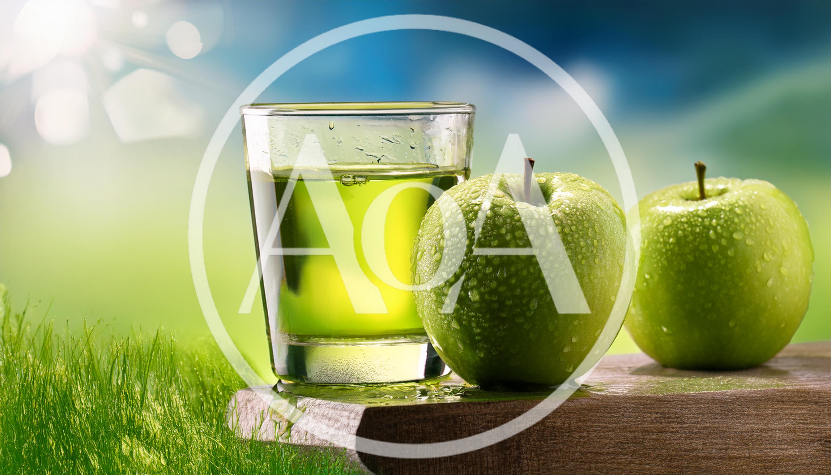 Glass Of Fresh Green Apple Juice With Whole Apples