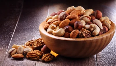 Assorted Mixed Nuts in a Wooden Bowl
