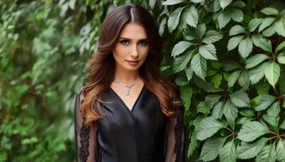 Portrait Of A Beautiful Woman In A Black Dress