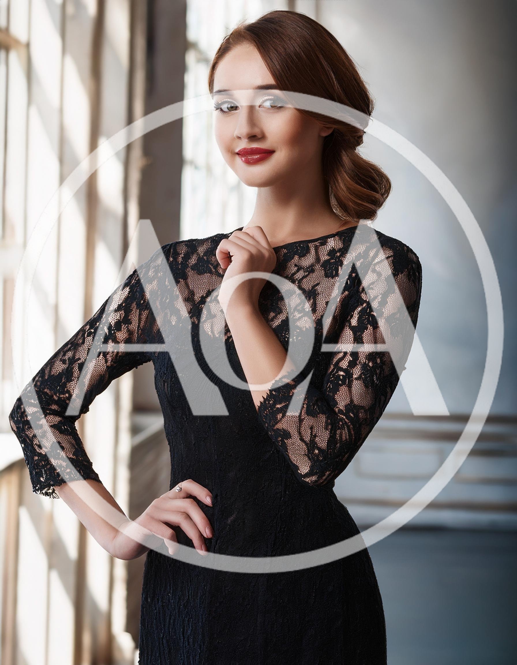 Elegant Woman In Black Lace Dress Posing Indoors