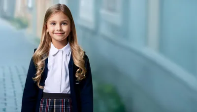 Portrait of a Young Schoolgirl in Uniform