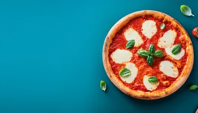 Margherita Pizza With Fresh Basil On Teal Background