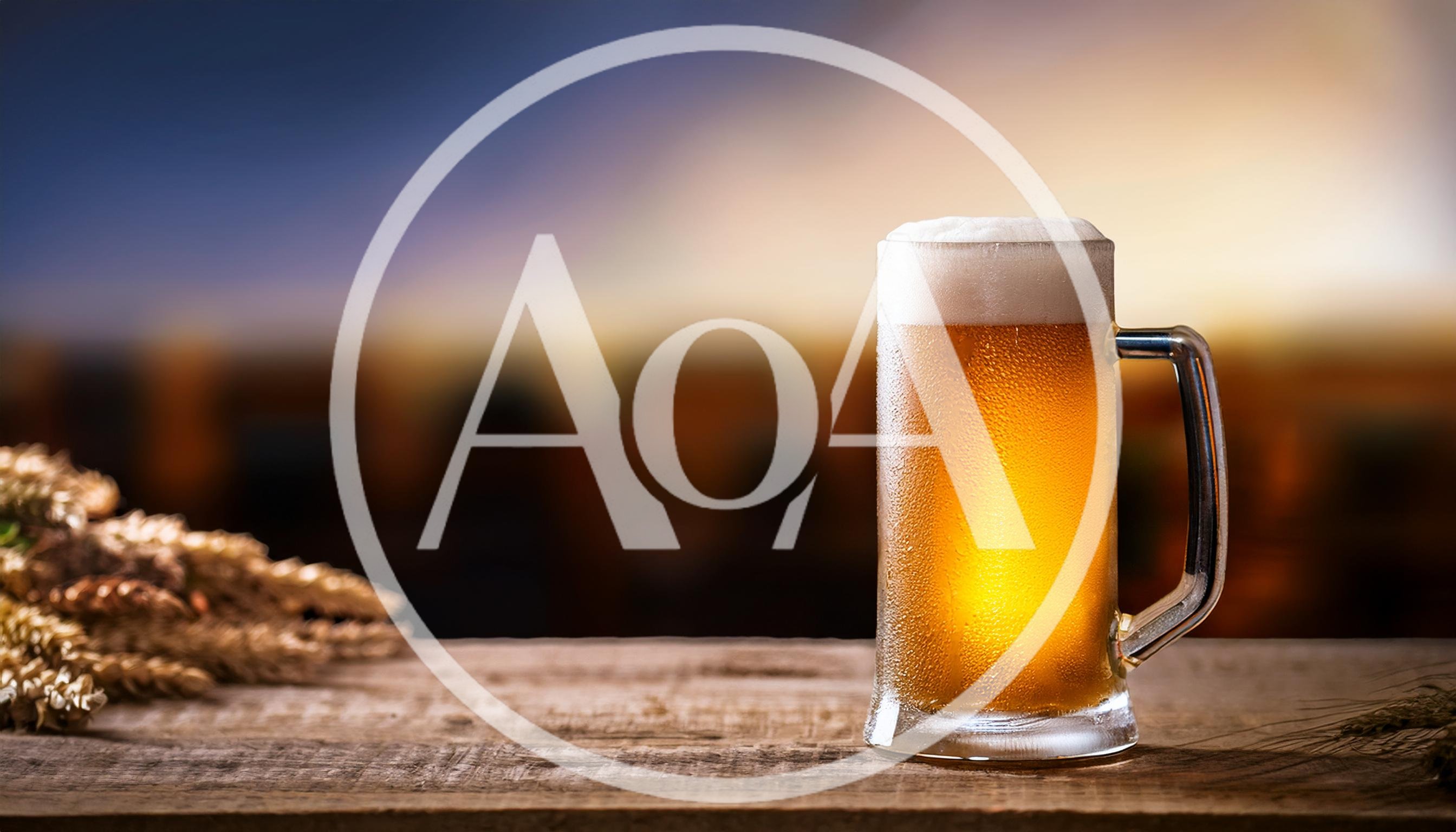 Cold Glass Of Beer On A Wooden Table