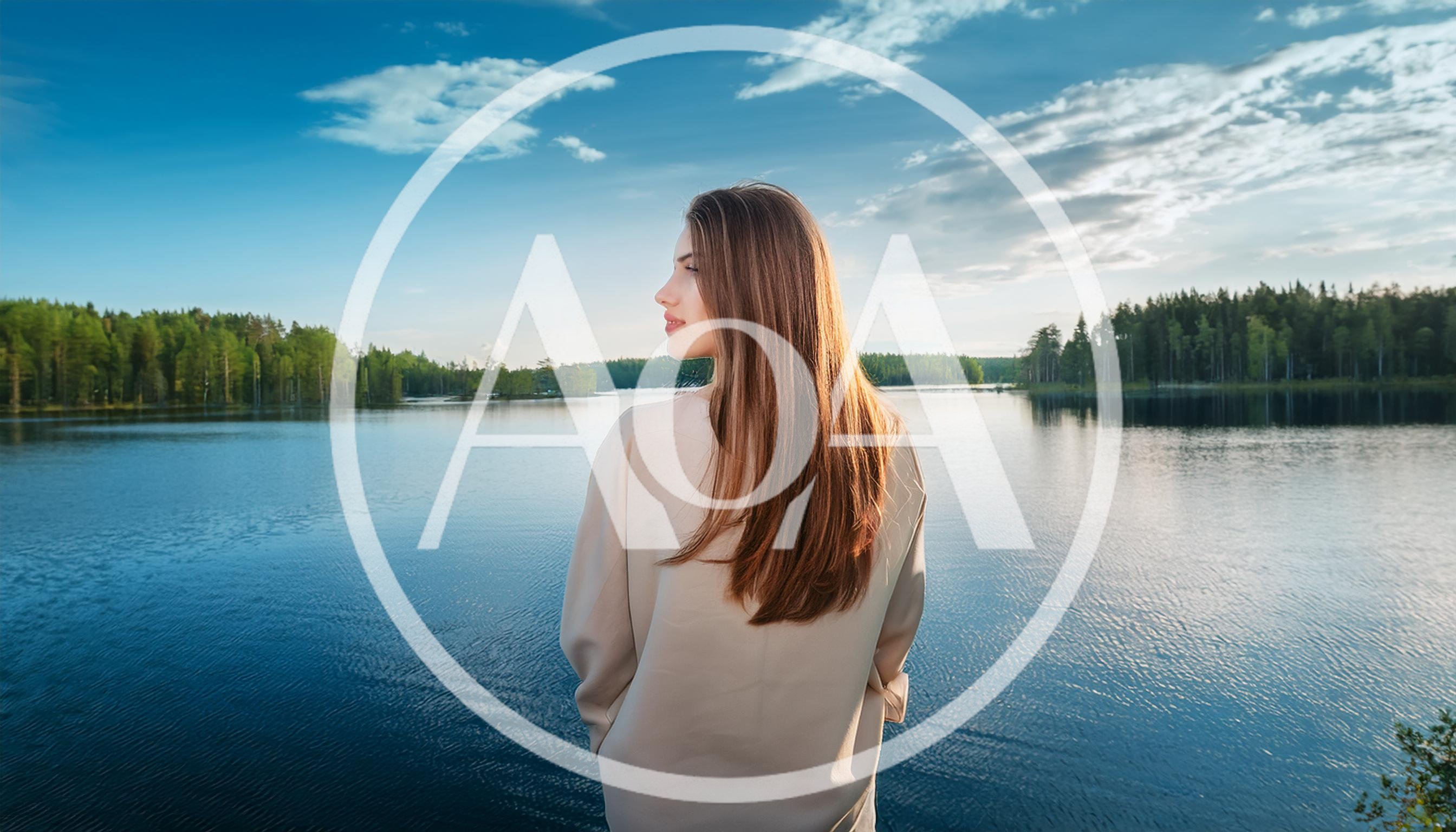 Young Woman Standing By A Calm Forest Lake