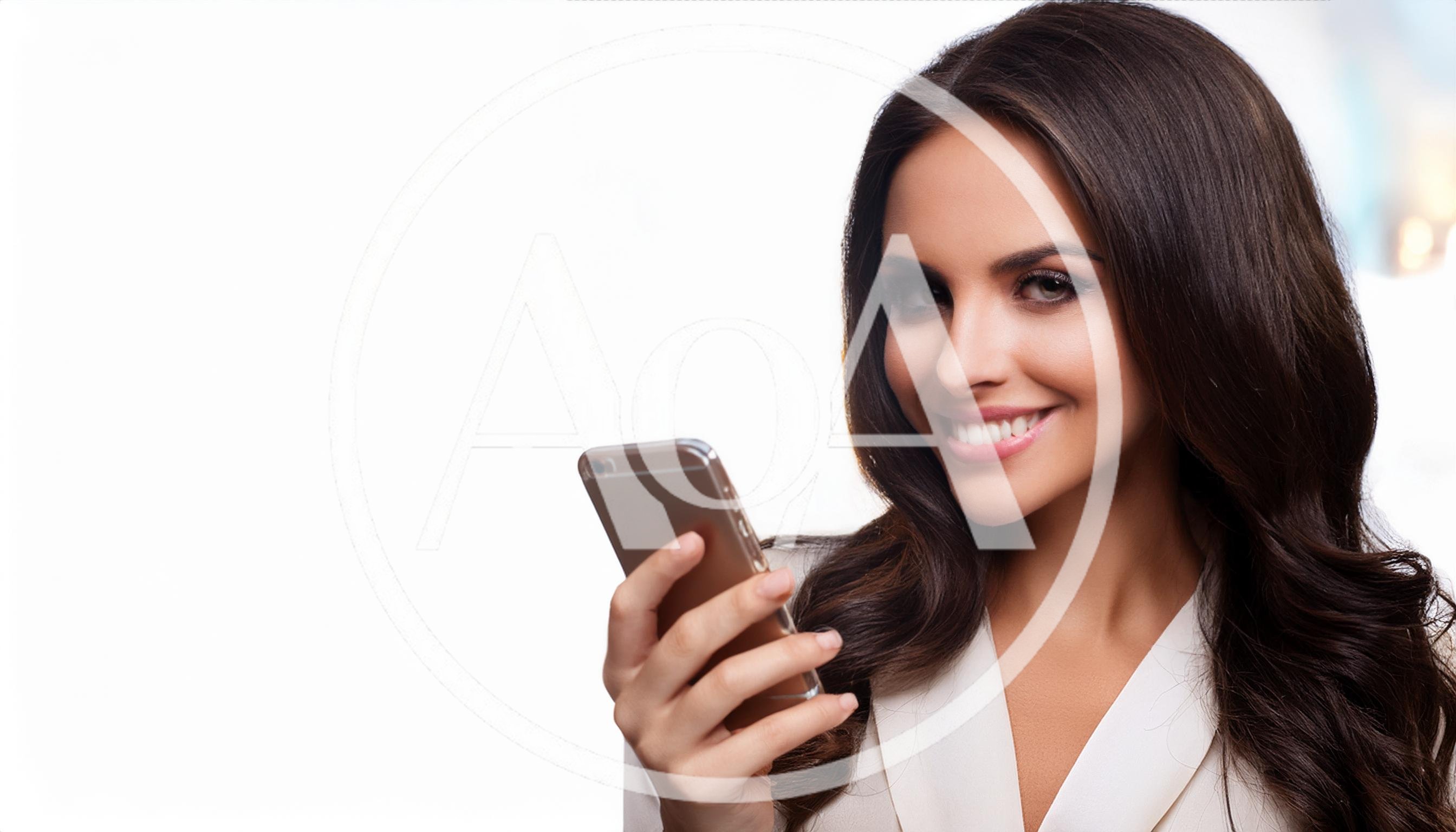 Smiling Businesswoman Using Smartphone Against White Background