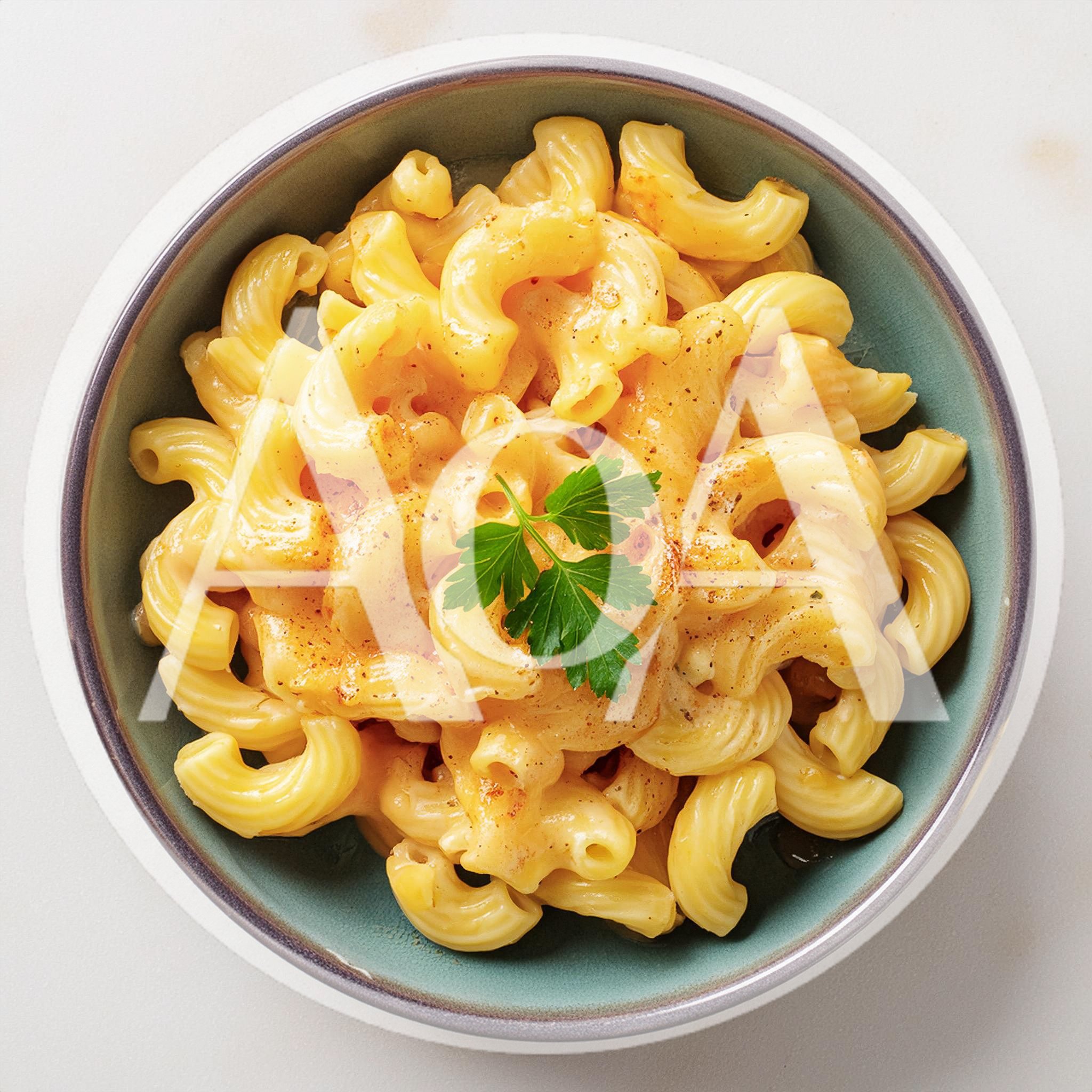 Bowl Of Creamy Macaroni And Cheese With Parsley