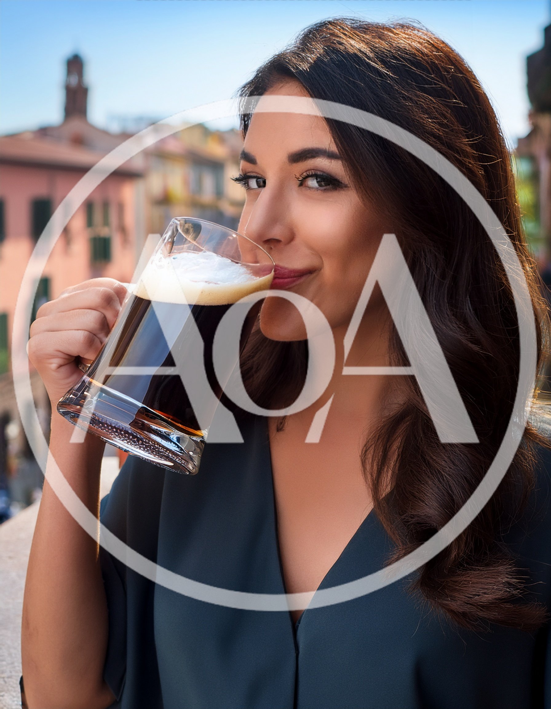Young Woman Drinking Dark Beer on a Sunny Terrace