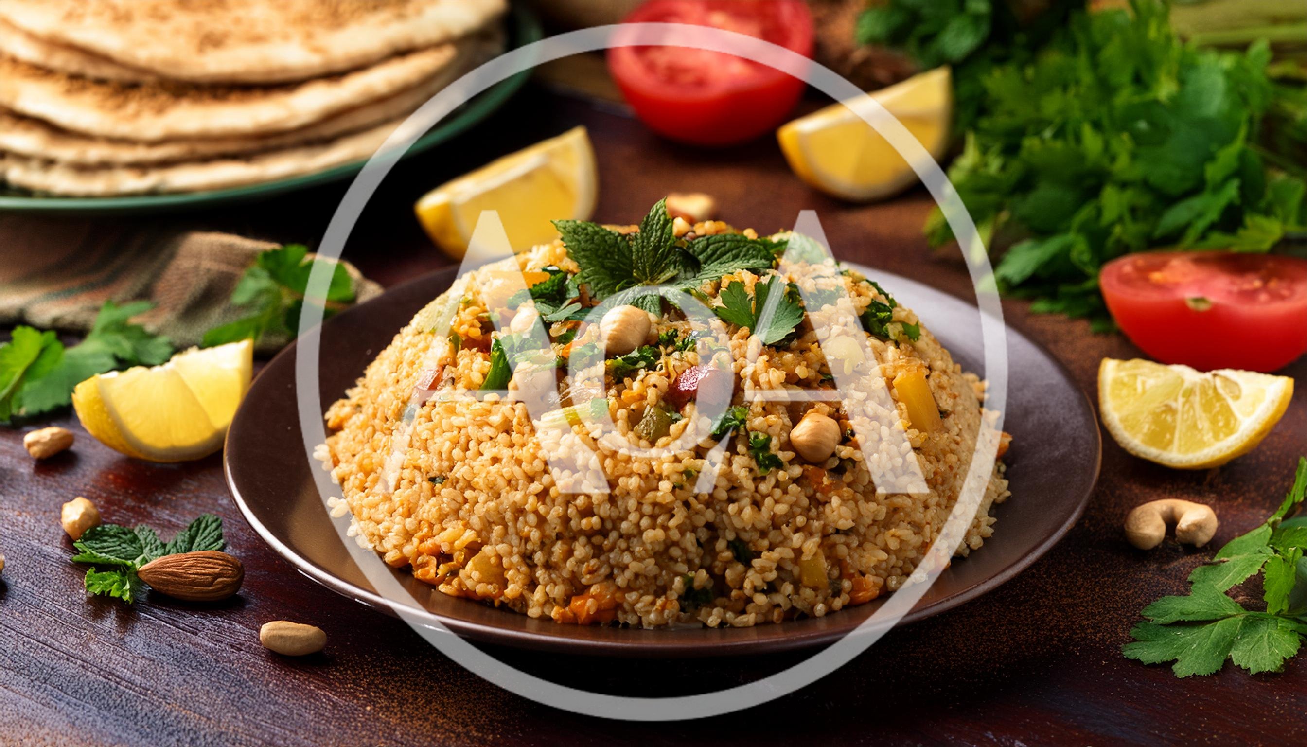 Bulgur Pilaf With Nuts And Herbs On A Plate