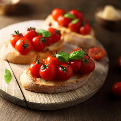 Fresh Tomato Bruschetta On A Wooden Board
