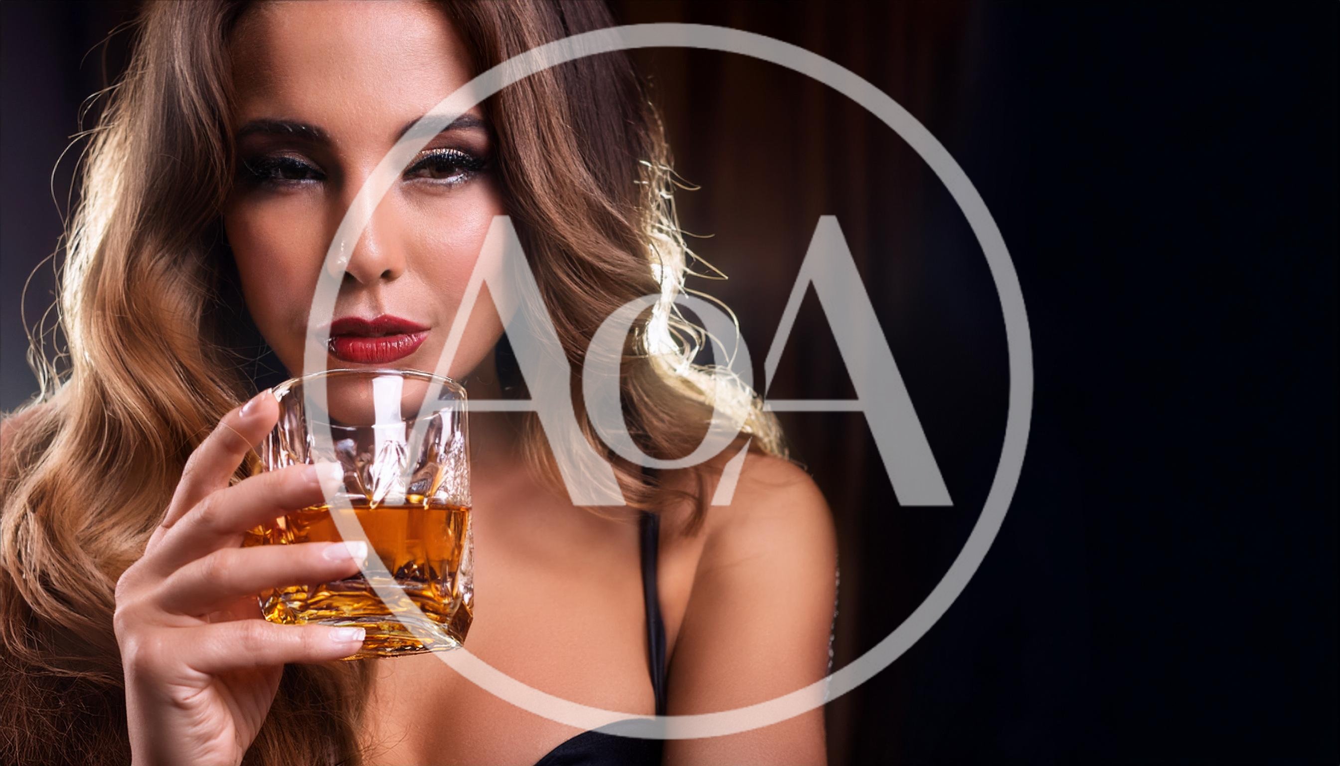 Beautiful Woman Holding A Glass Of Whiskey