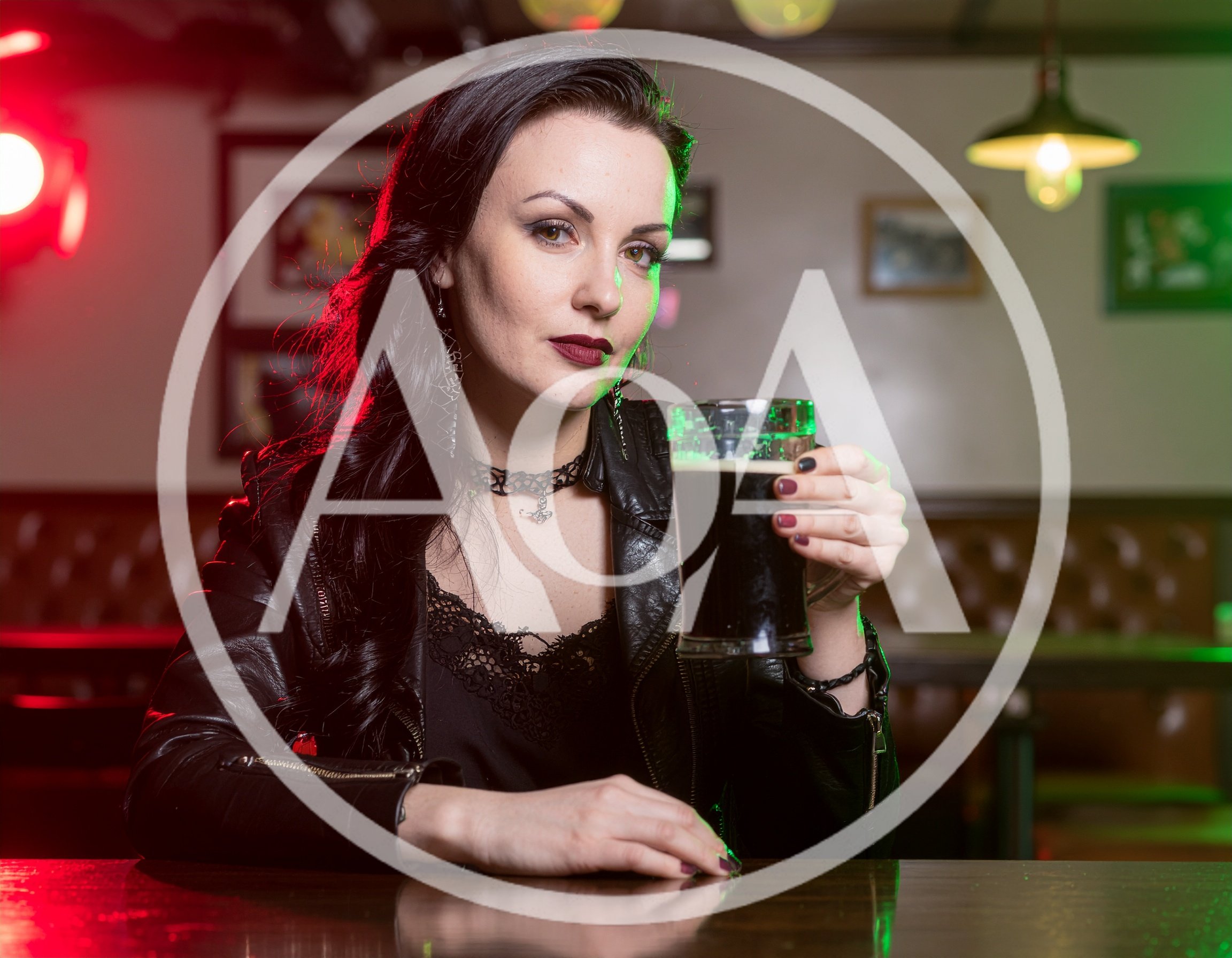 Gothic Woman Holding A Beer Mug In A Pub