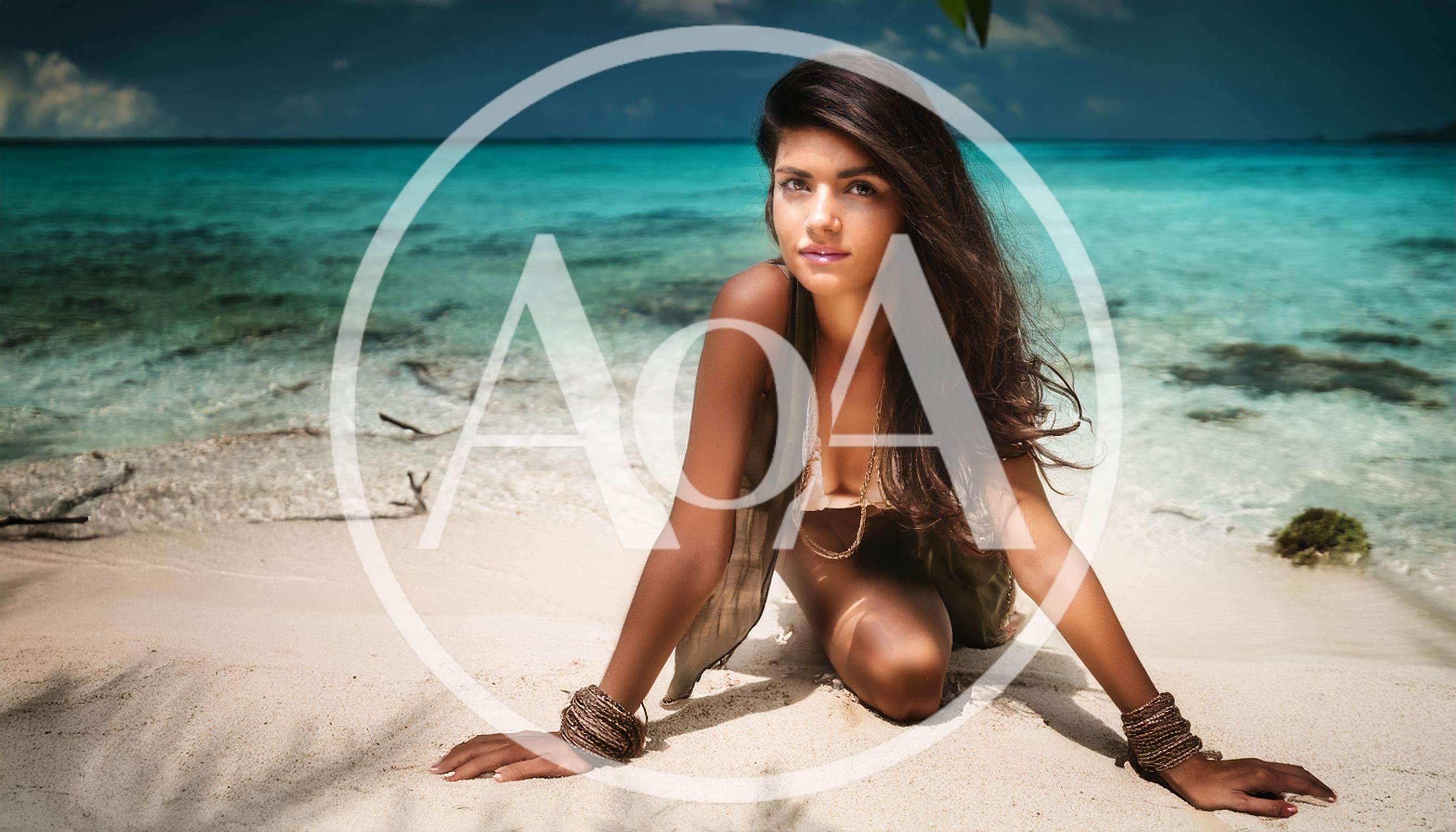 Young Woman Posing On Tropical Beach Sand