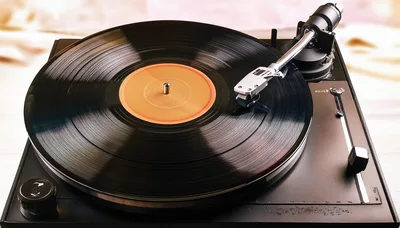 Vintage Turntable Playing A Vinyl Record