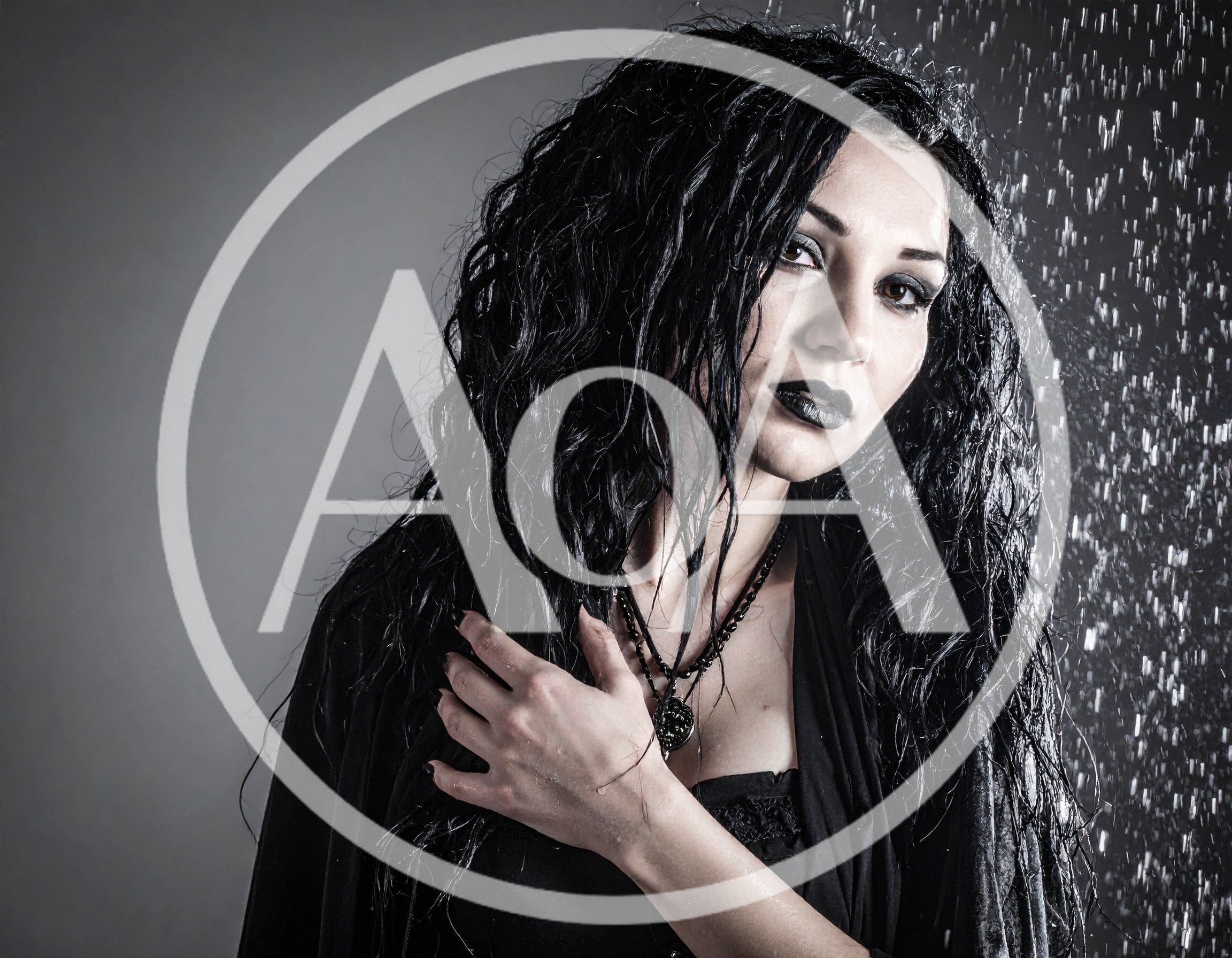Gothic Woman With Wet Hair Standing In Rain