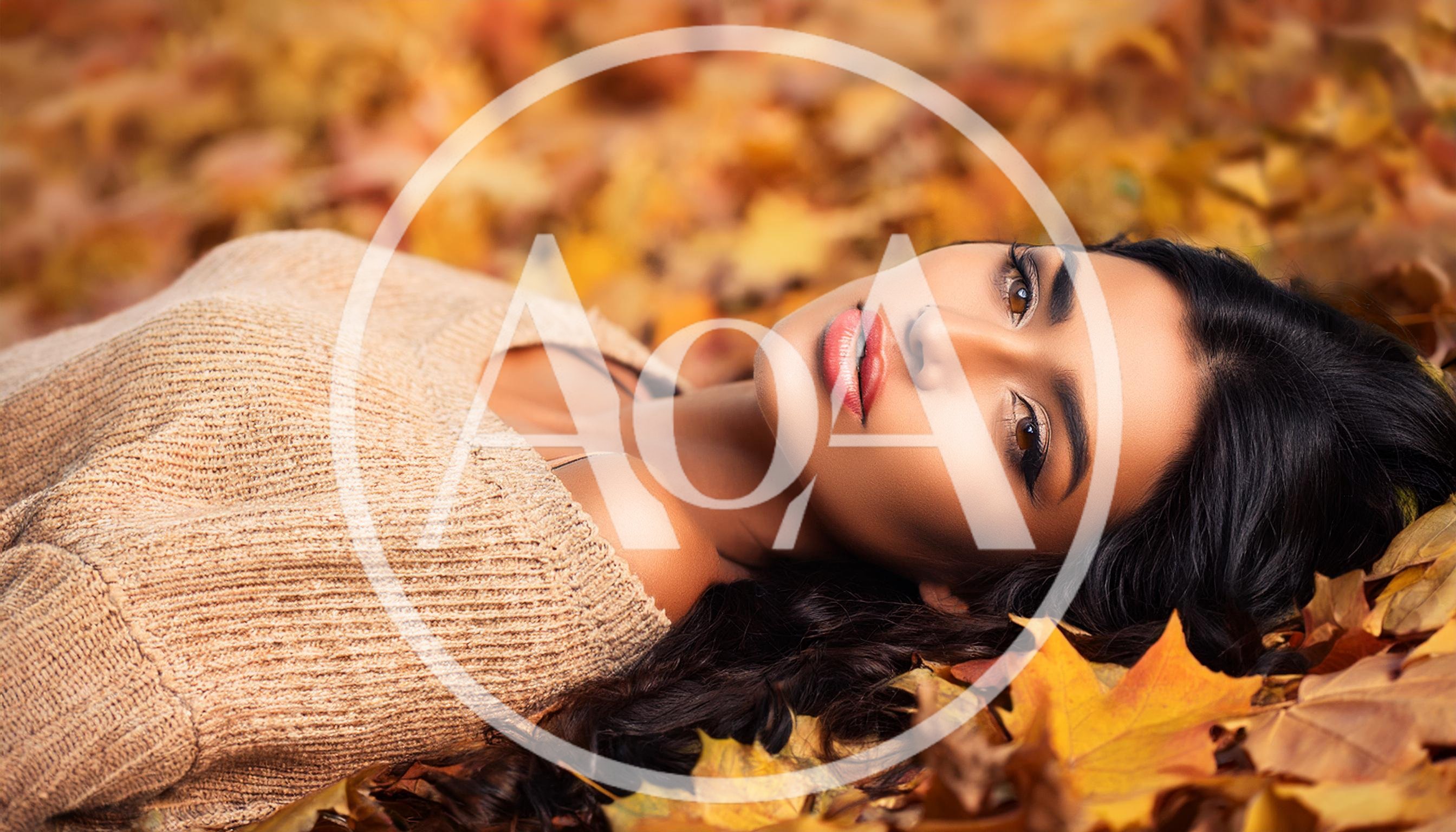 Beautiful Woman Lying In Autumn Leaves