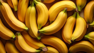 Fresh Yellow Bananas Arranged On A Textured Surface