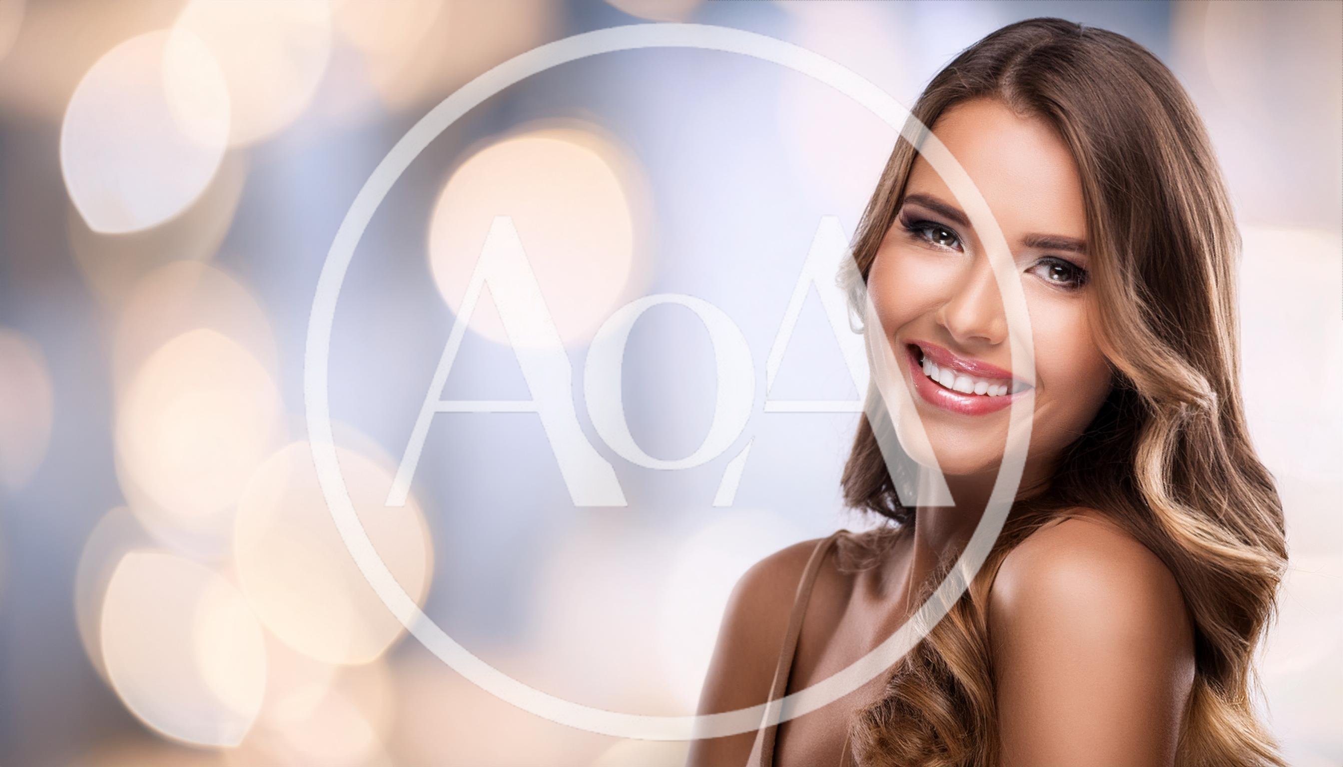 Portrait Of A Smiling Young Woman With Wavy Hair