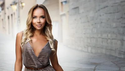 Portrait Of A Beautiful Blonde Woman In A Dress