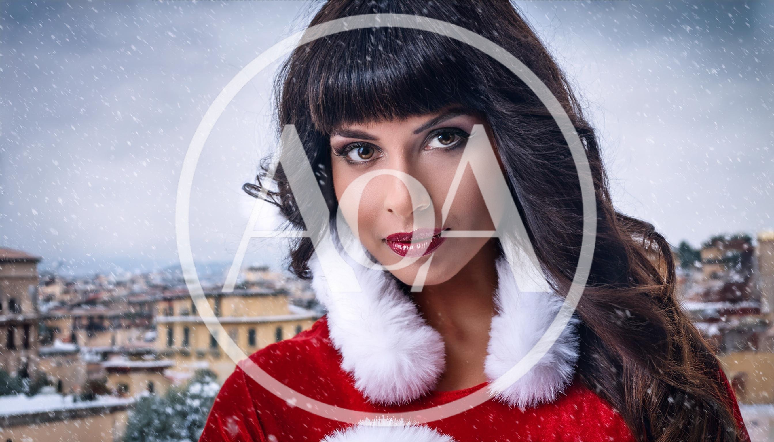 Beautiful Woman Dressed As Santa Claus In Snowy City