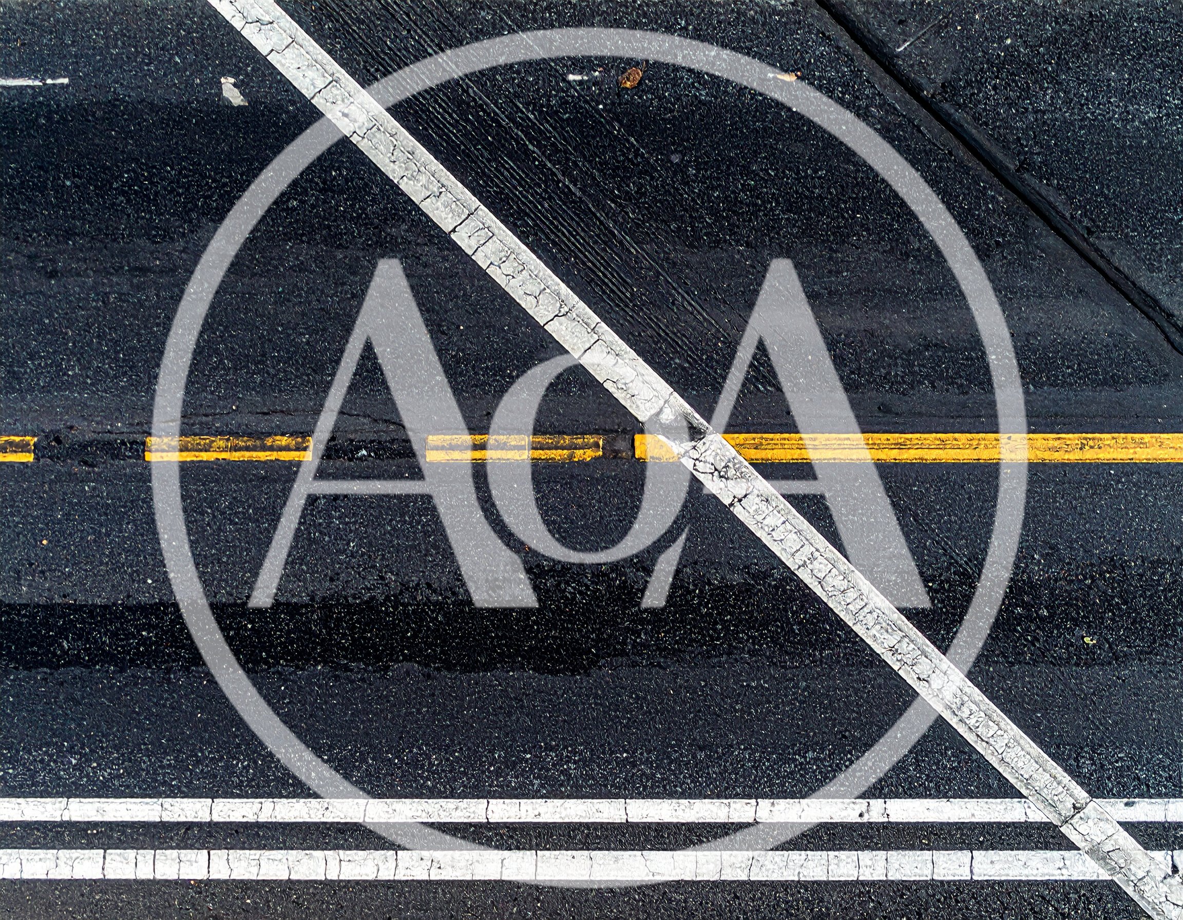 Aerial View Of Asphalt Road With Painted Traffic Markings