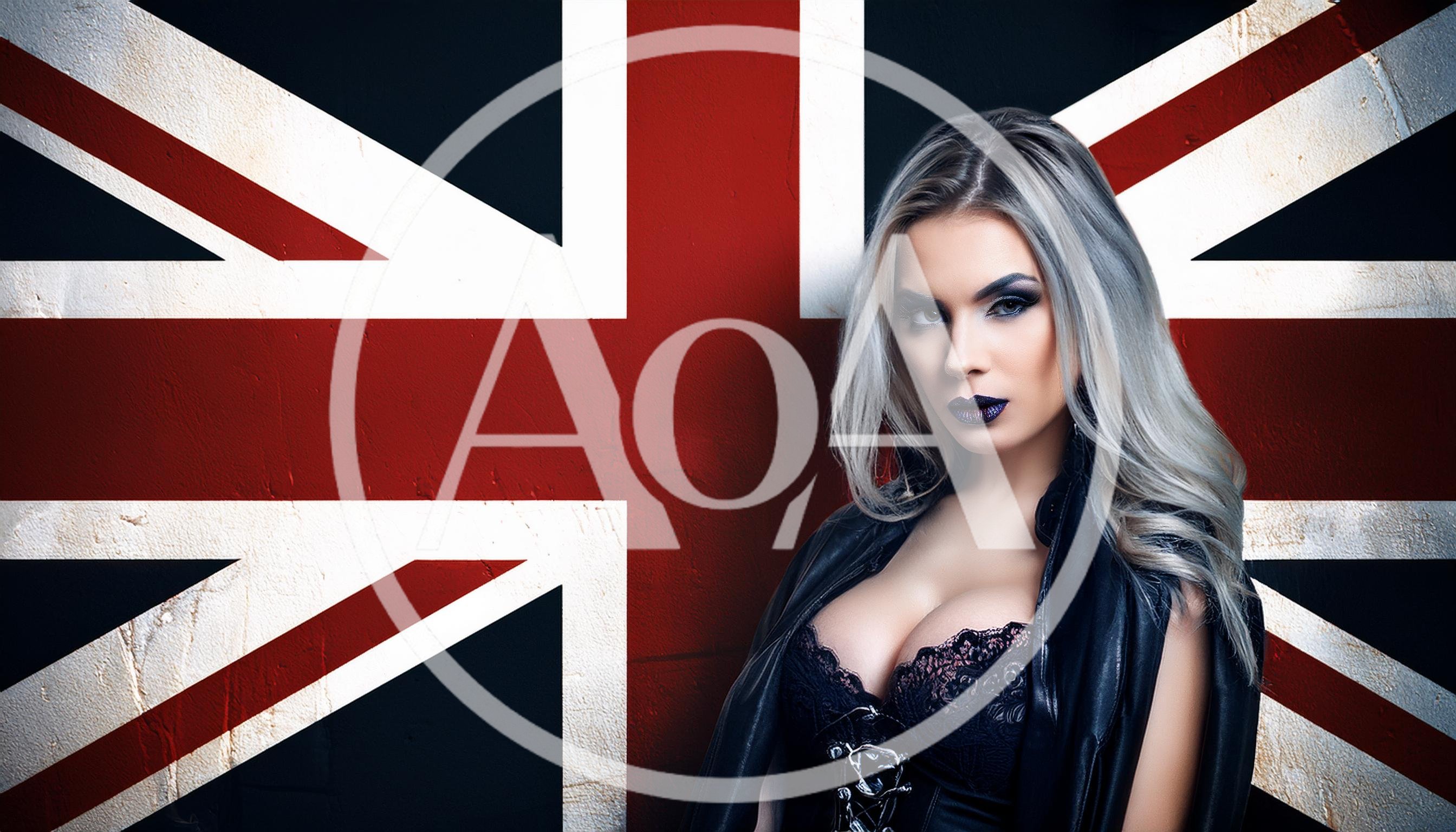 Gothic Woman Posing Against A British Flag Background