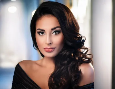 Portrait Of A Beautiful Woman With Wavy Dark Hair