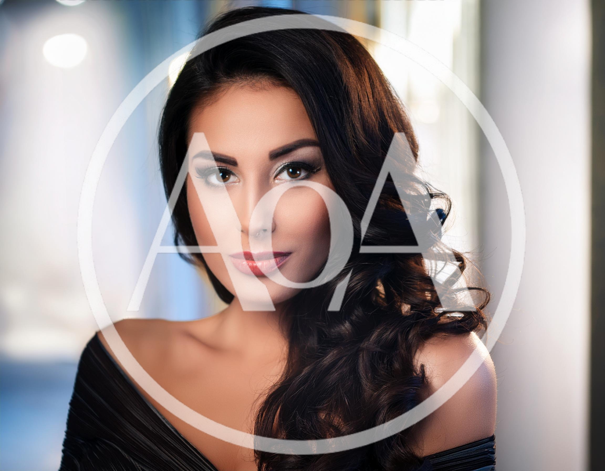 Portrait Of A Beautiful Woman With Wavy Dark Hair
