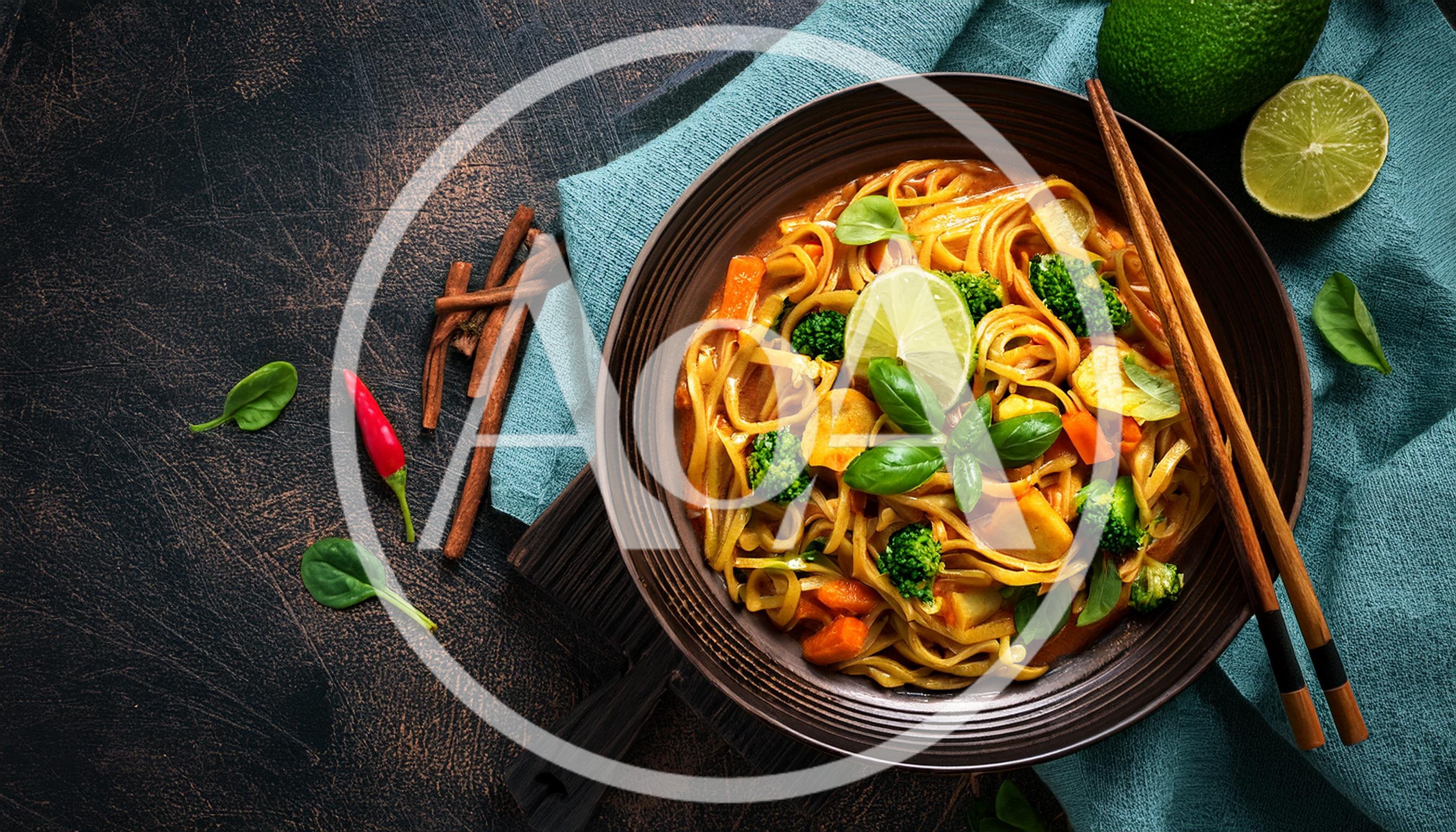Bowl Of Thai Red Curry Noodles With Vegetables