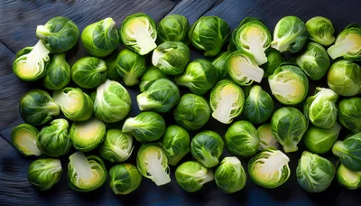 Fresh Brussels Sprouts Scattered on Dark Wooden Surface