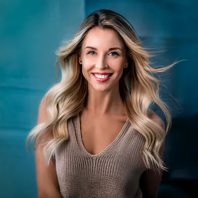 Portrait Of A Smiling Blonde Woman