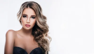 Portrait Of A Beautiful Young Woman With Wavy Hair