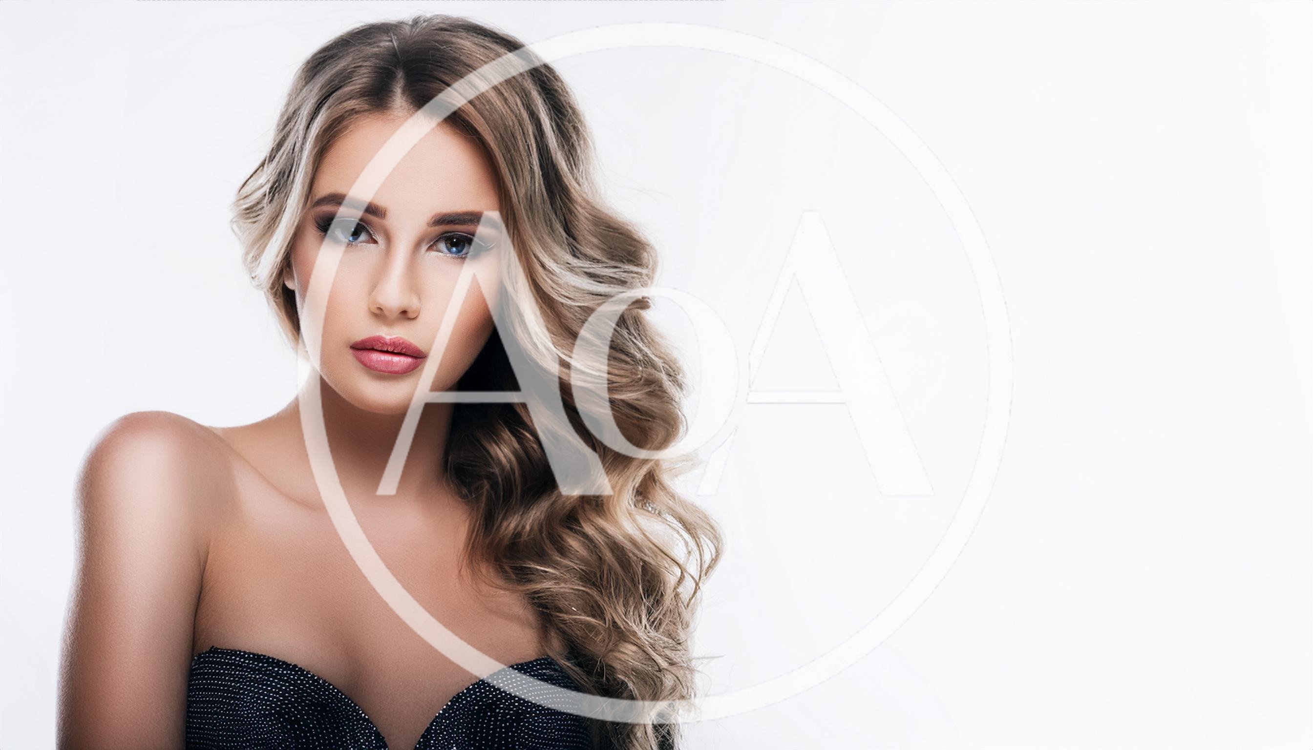 Portrait Of A Beautiful Young Woman With Wavy Hair