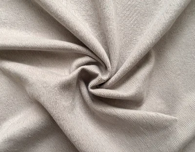 Soft Beige Knitted Fabric Texture Swirl