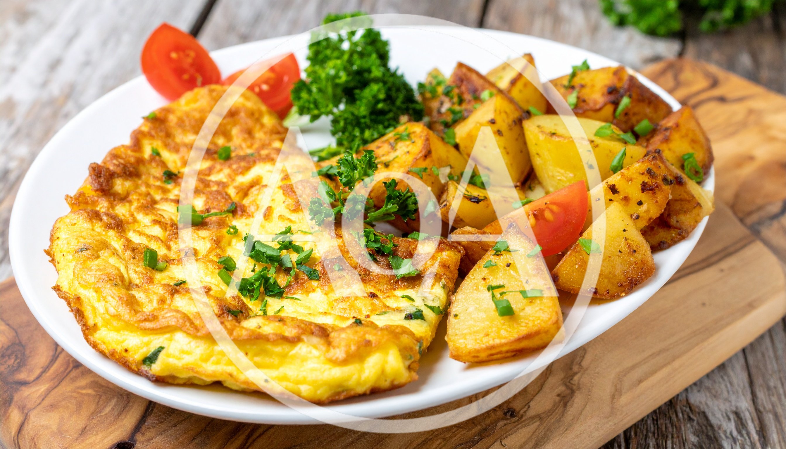 Omelet With Roasted Potatoes And Fresh Herbs