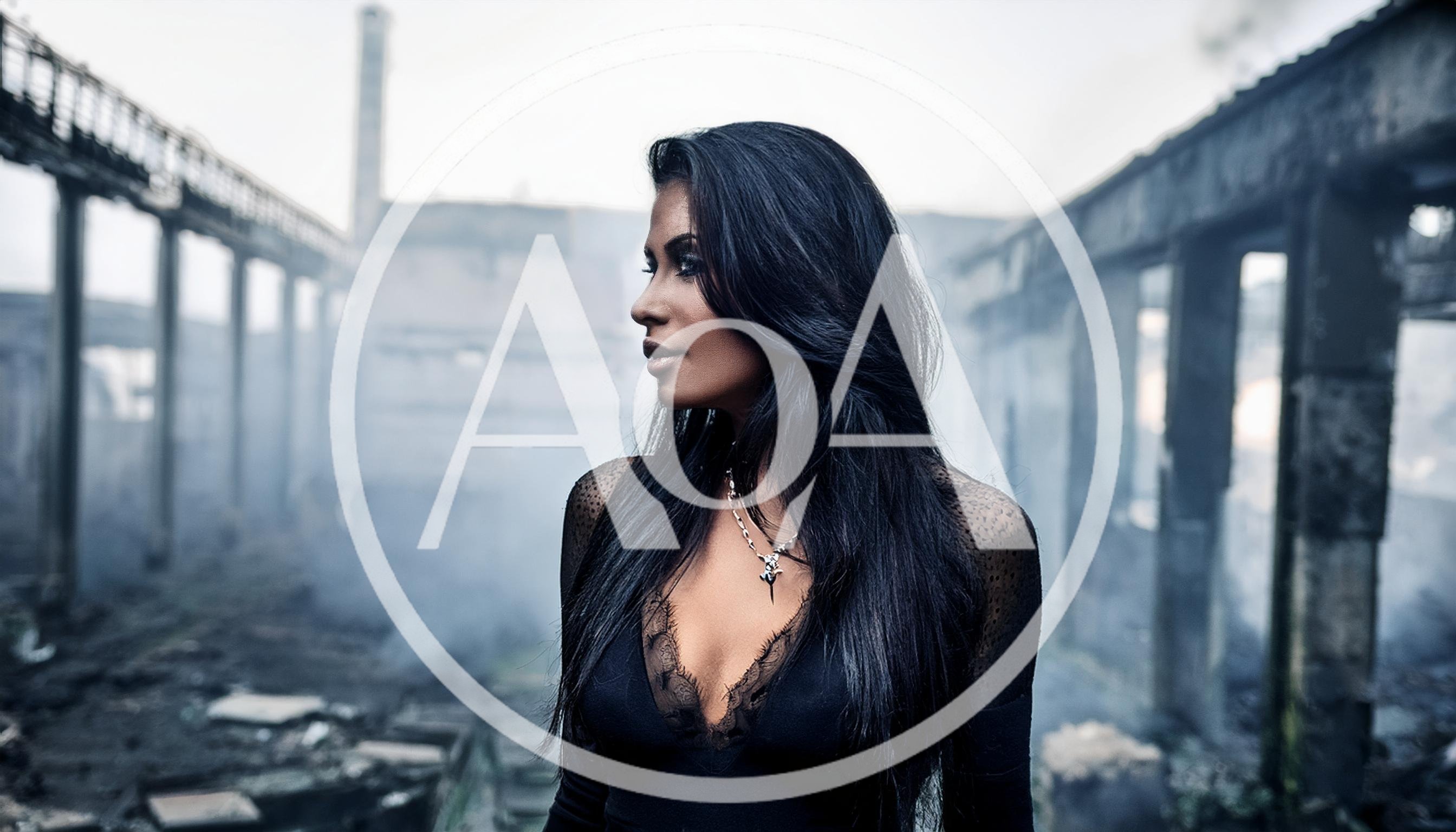 Woman With Long Dark Hair Standing In Ruined Factory