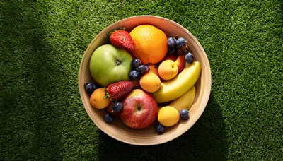Fresh Assorted Fruits In A Wooden Bowl