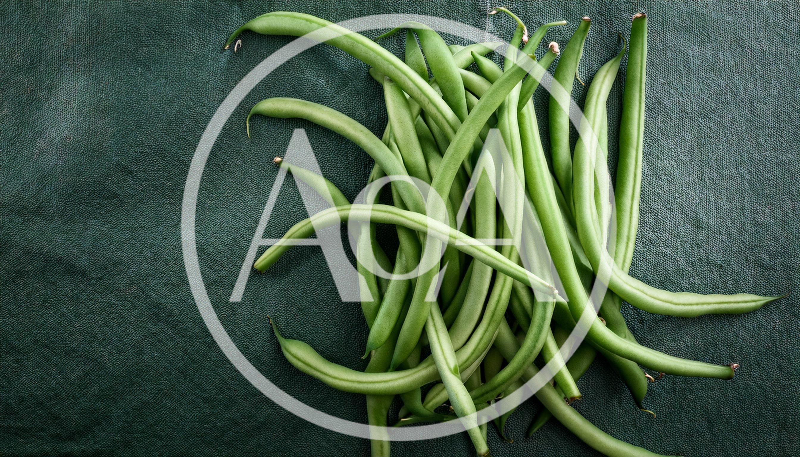 Fresh Green Beans Arranged on Dark Textured Background